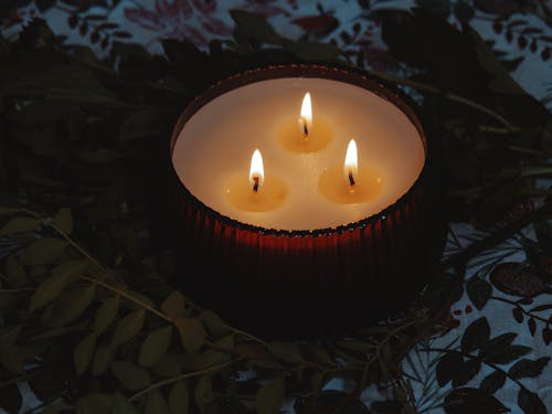 Candle on a Table in the Dark