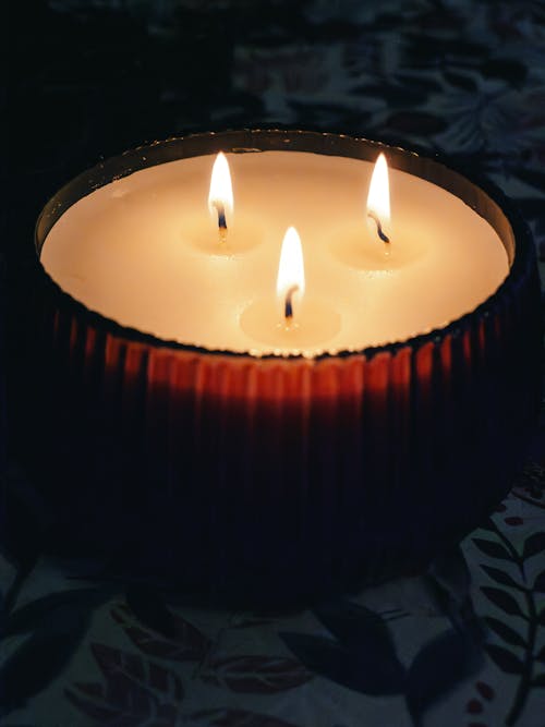 Three Flames Burning on a Candle