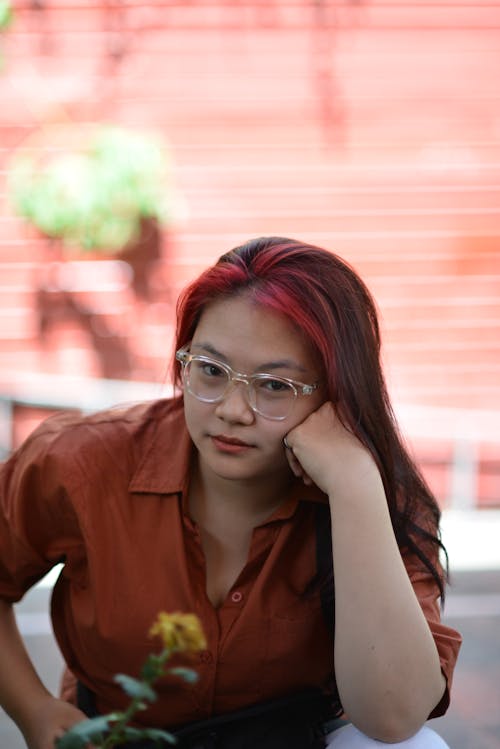 Young Woman with Dyed Red Hair 