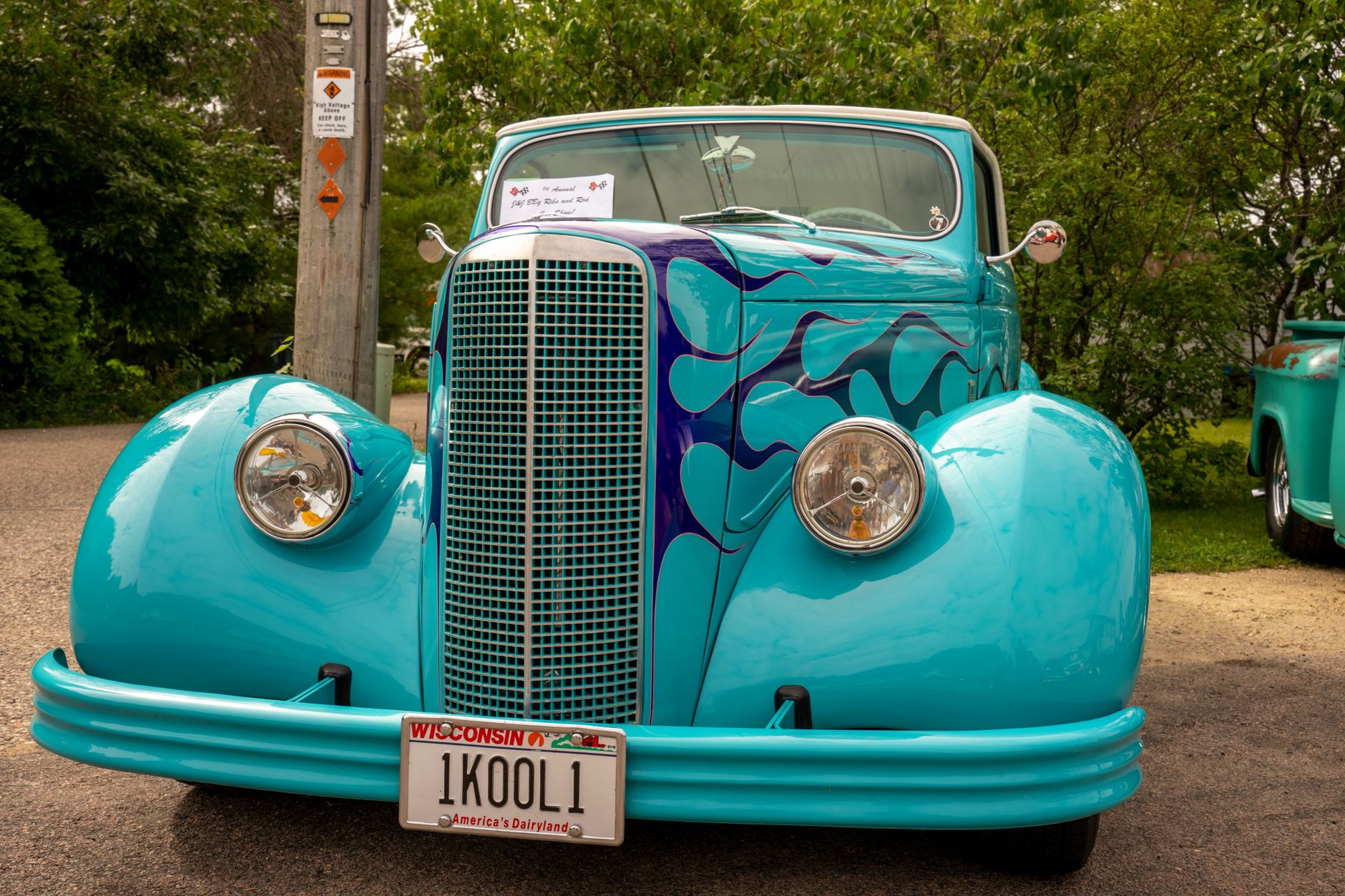 Classic blue vintage Ford pickup with custom flames in Nelson, WI.