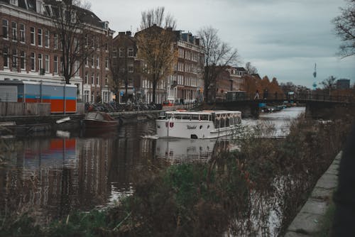 Passenger Ship on Canal in Amsterdam