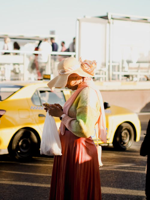 Woman Using Smartphone in City