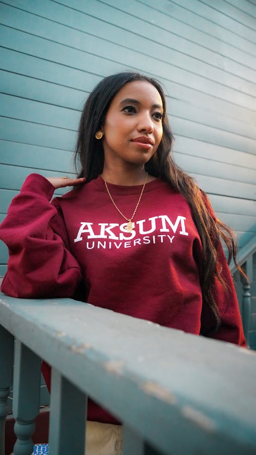 Woman in University Pullover