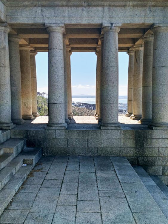 A sea view through the monument columns
