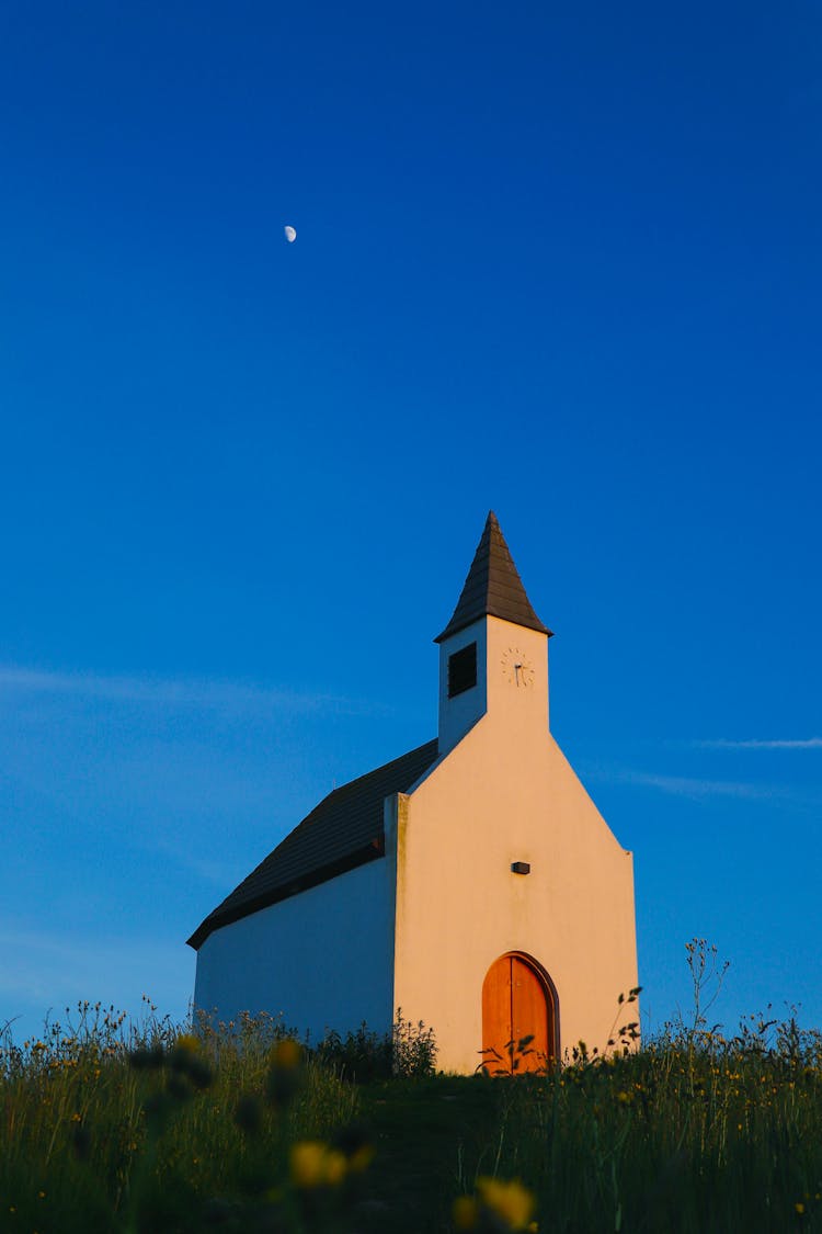 Church In Countryside At Sunset