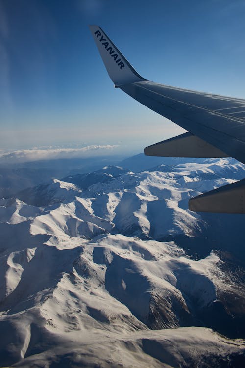 Imagine de stoc gratuită din avion, fereastra avionului, munte înzăpezit