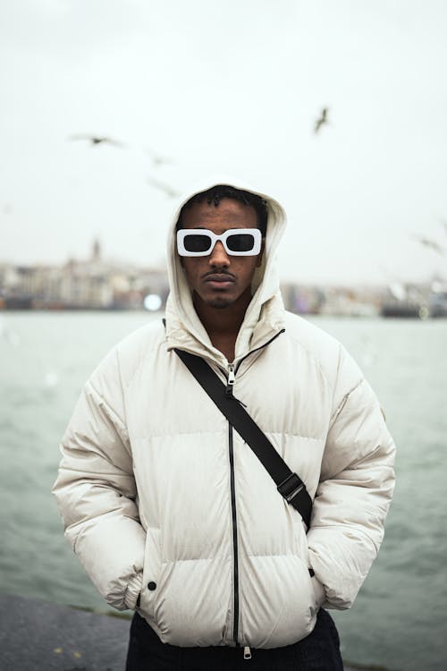 Portrait of Man in White Jacket and Sunglasses