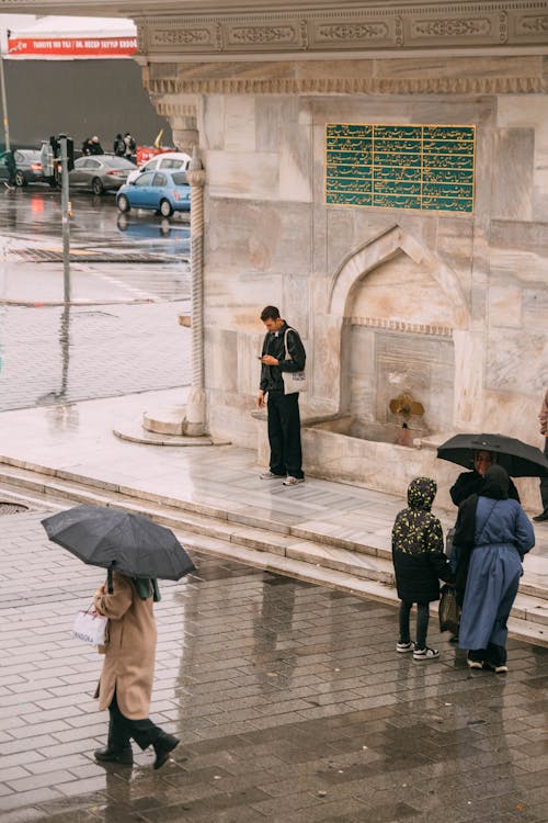 People in City on Rainy Day