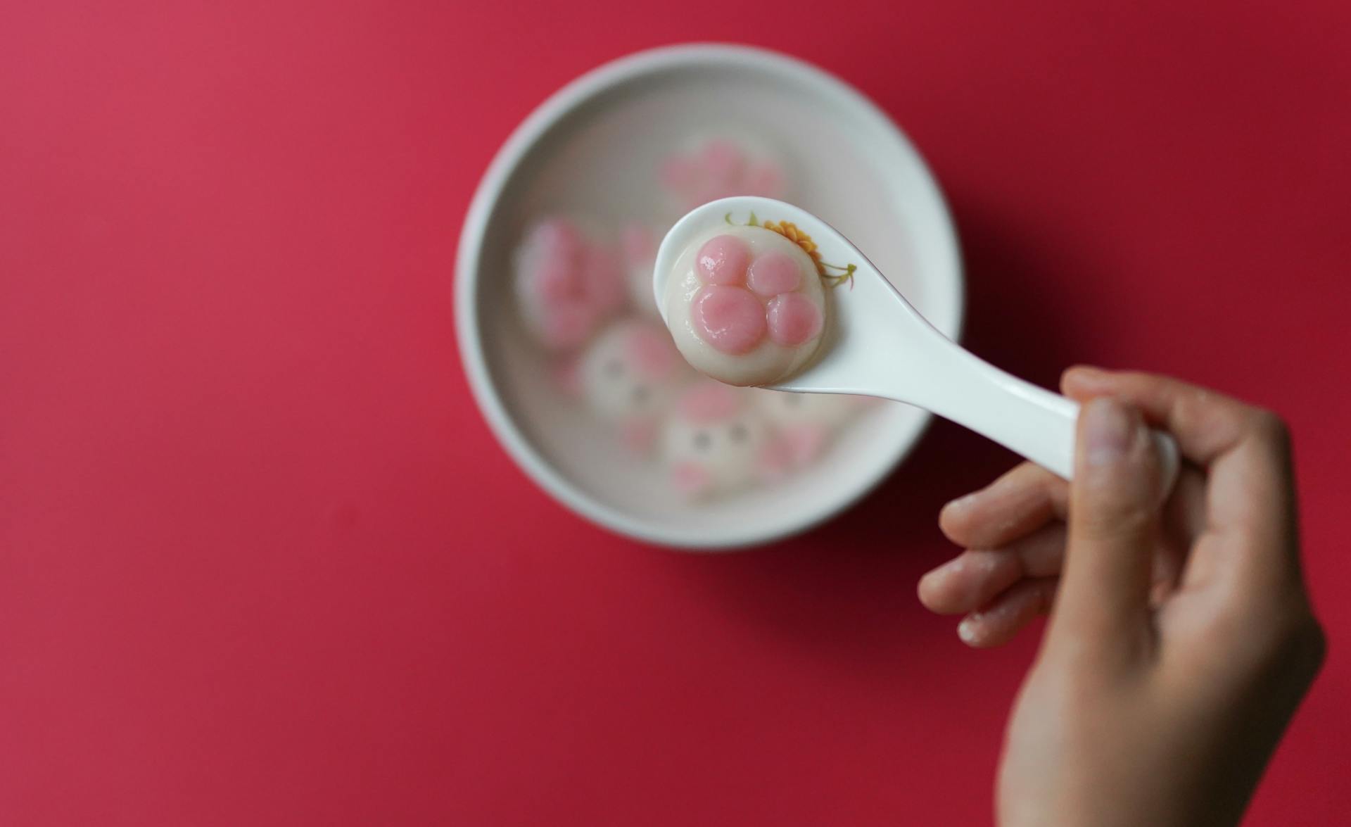 Person Holding Spoon With Food