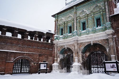 Free The ornate Krutitsy Metochion in Moscow, adorned with intricate details and covered in snow. Stock Photo
