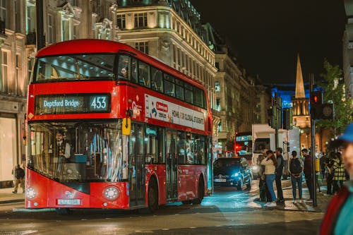 Red Double Decker on Oxford Street in London at Night