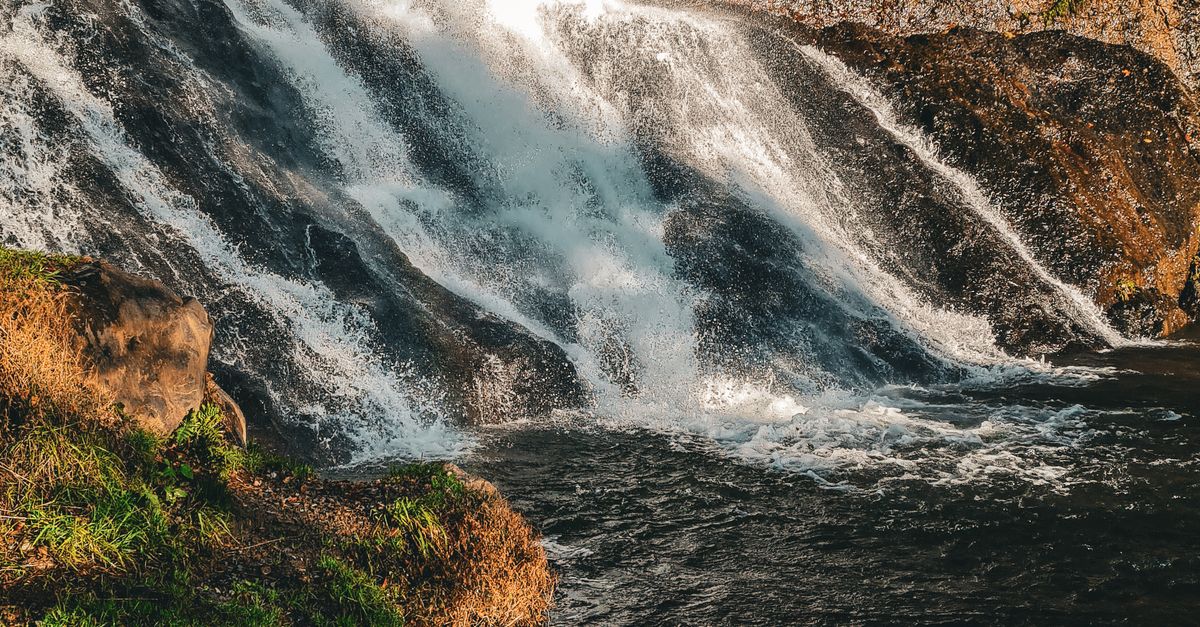 Waterfall on Rocks in Forest · Free Stock Photo