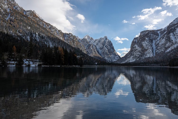 Lake In Mountains With Forest On Hill Near