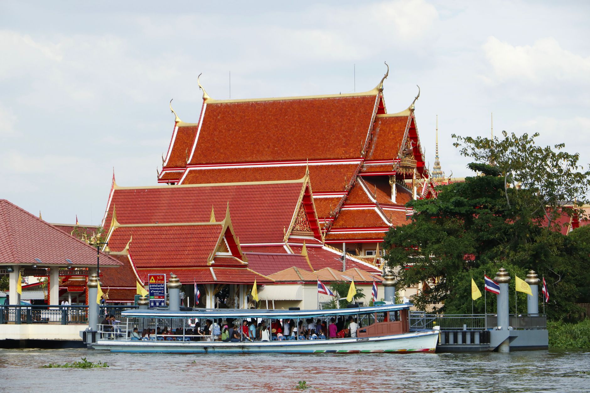 Boat on river near temple in Thailand