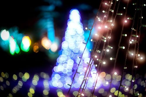 Free Colorful bokeh lights in a festive setup, creating a vibrant and dreamy holiday atmosphere. Stock Photo