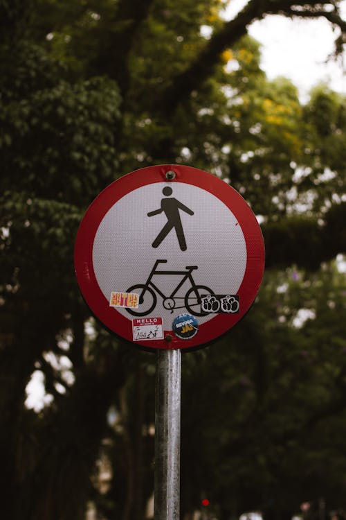 Stickers on Road Sign