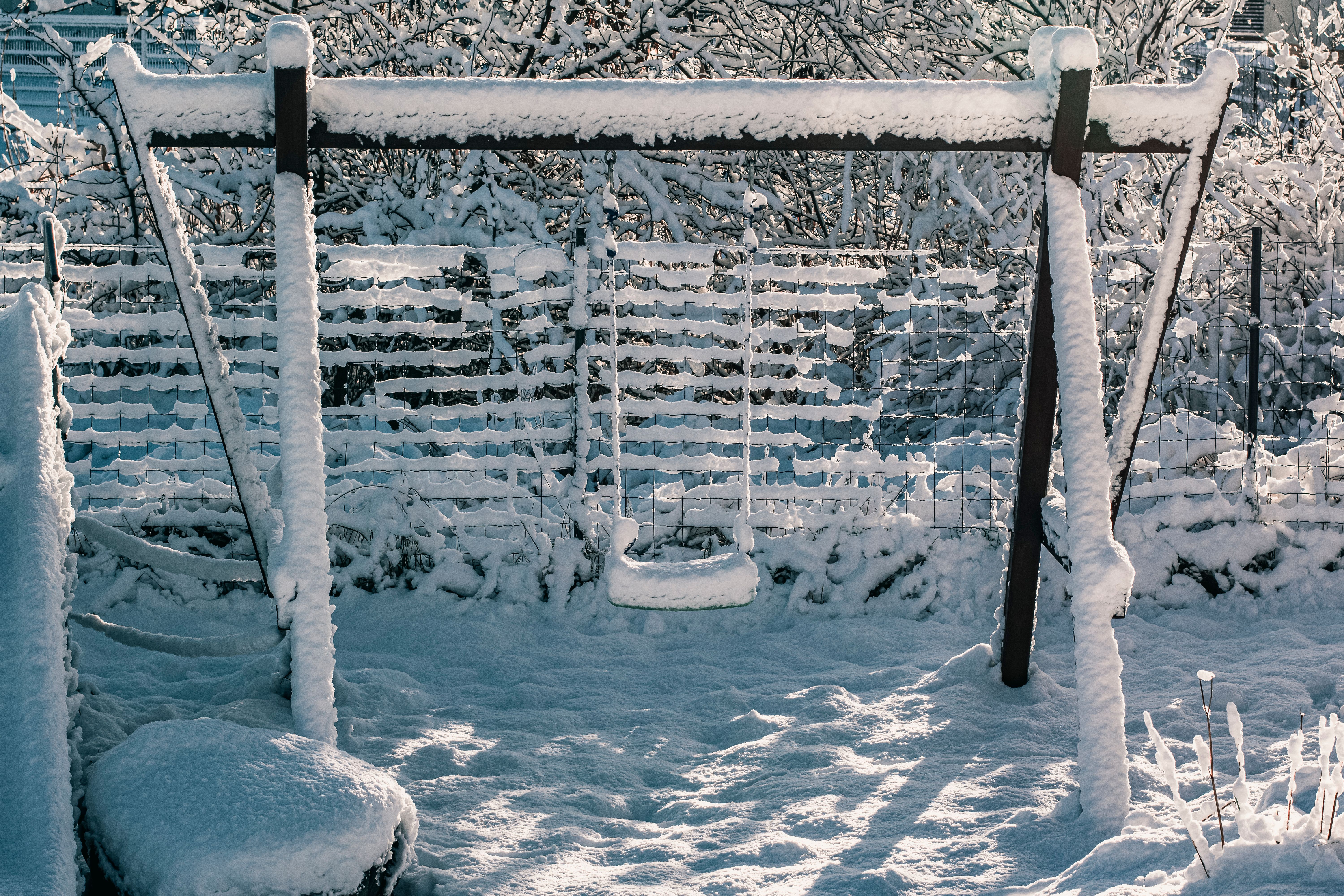 Garden Swing in Snow · Free Stock Photo