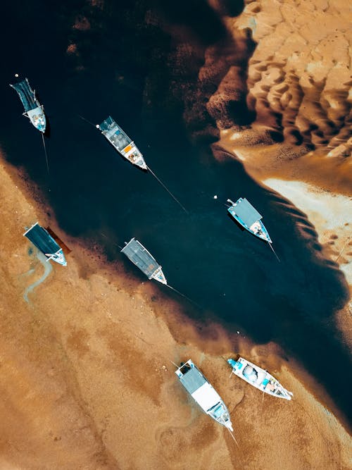 balıkçı teknesi, dikey atış, drone çekimi içeren Ücretsiz stok fotoğraf