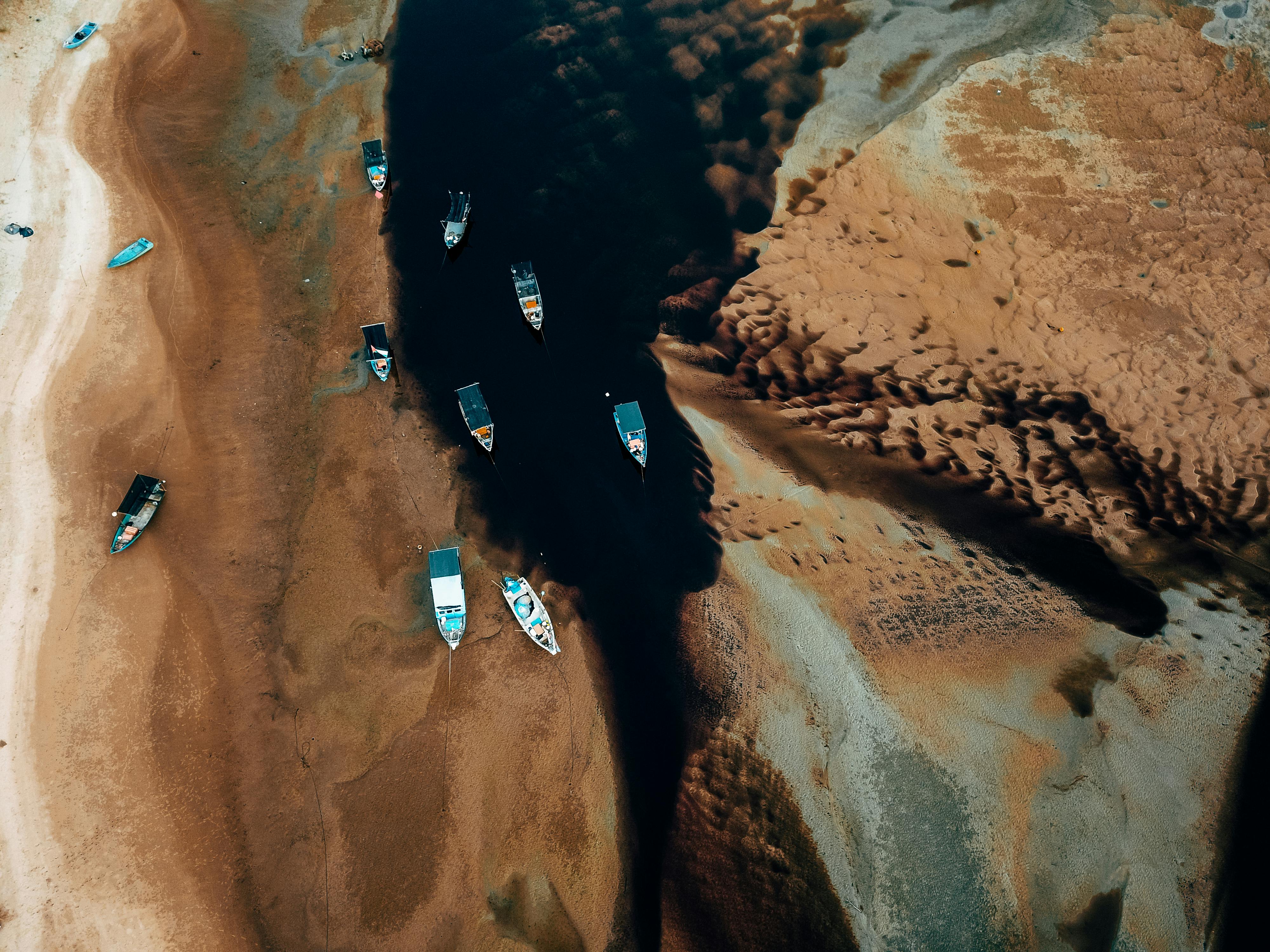 canoes on lagoon in birds eye view