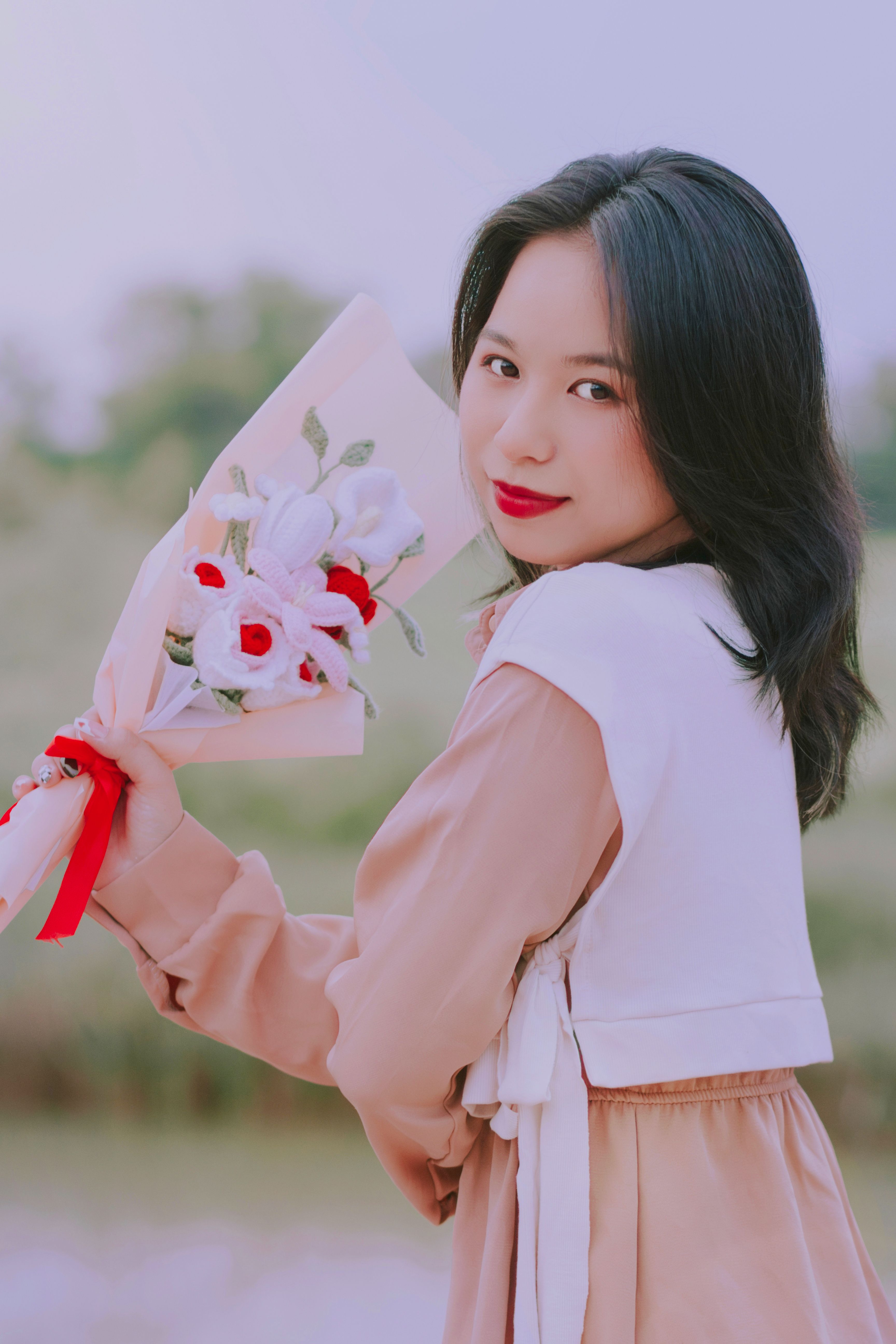 Portrait of a Woman with Flowers · Free Stock Photo