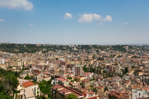 Free Aerial view of the expansive urban landscape of Naples, Italy on a clear day. Stock Photo