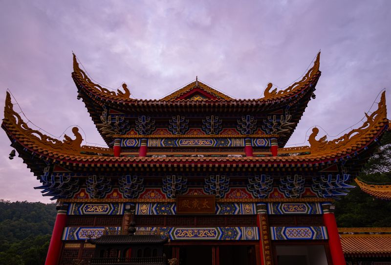 Ornate Chinese Buddhist temple with colorful roof decorations