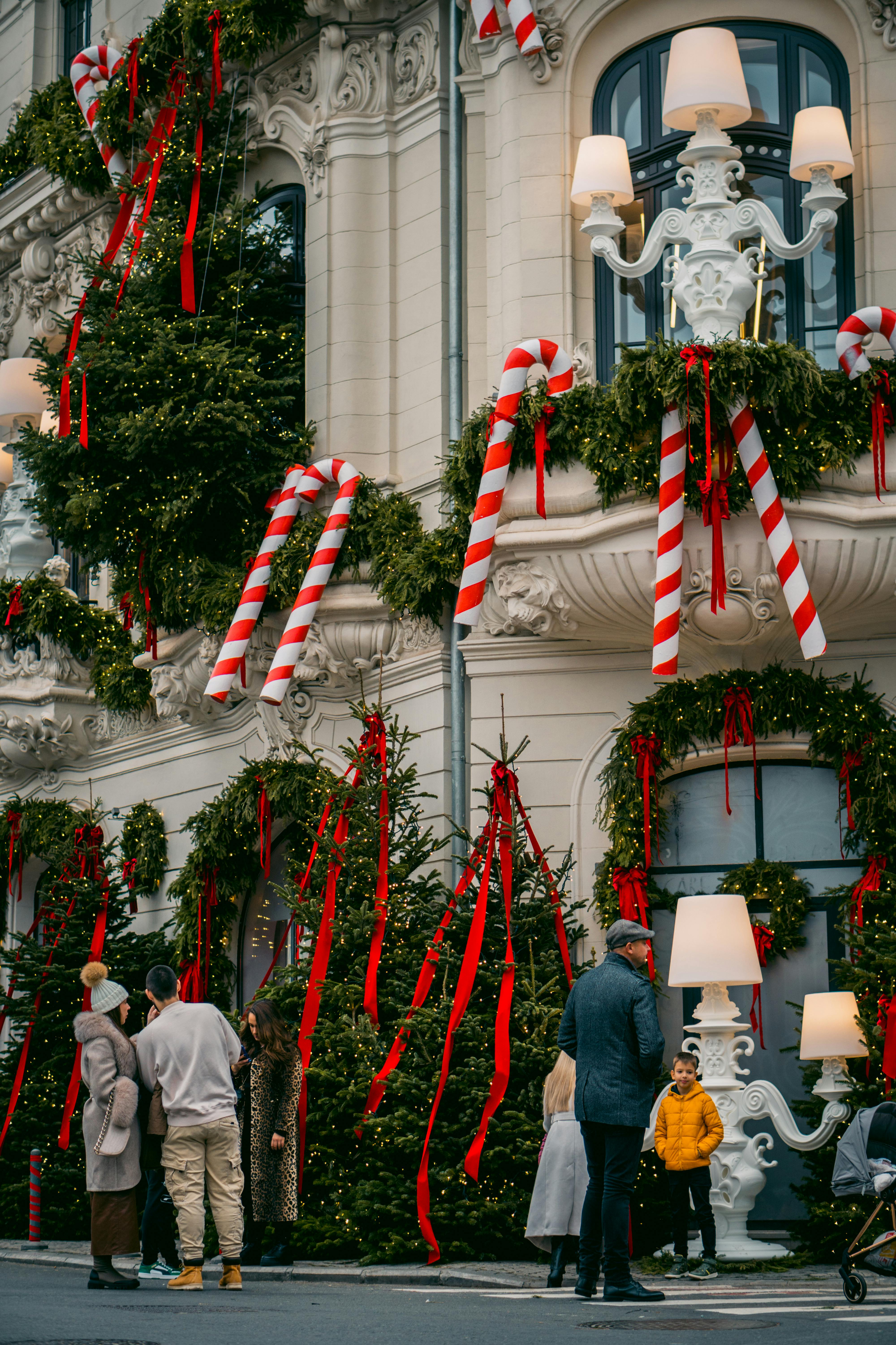 A beautifully decorated building with Christmas ornaments in Bucharest, Romania.