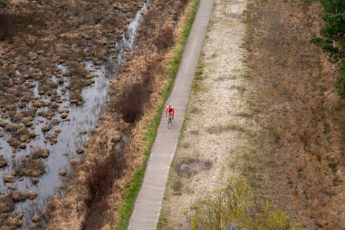 Безкоштовне стокове фото на тему «велосипед, велосипедист, водно-болотні угіддя»