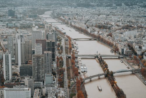 Free Aerial View of Paris on the Banks of River Seine in Autumn Stock Photo