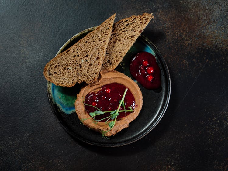 Cranberry Jam And A Slices Of Wholemeal Bread