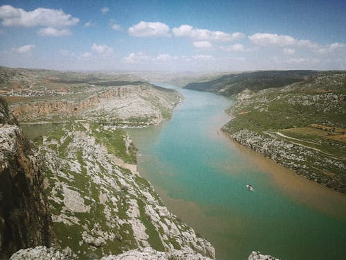 Rocks by River in Landscape