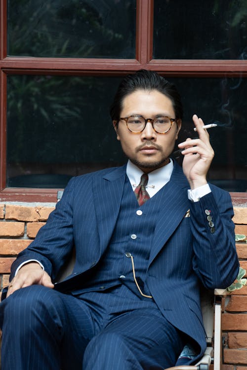 Elegant Man Smoking a Cigarette 