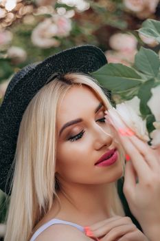 Portrait of a young blonde woman with flowers, exuding elegance and style.
