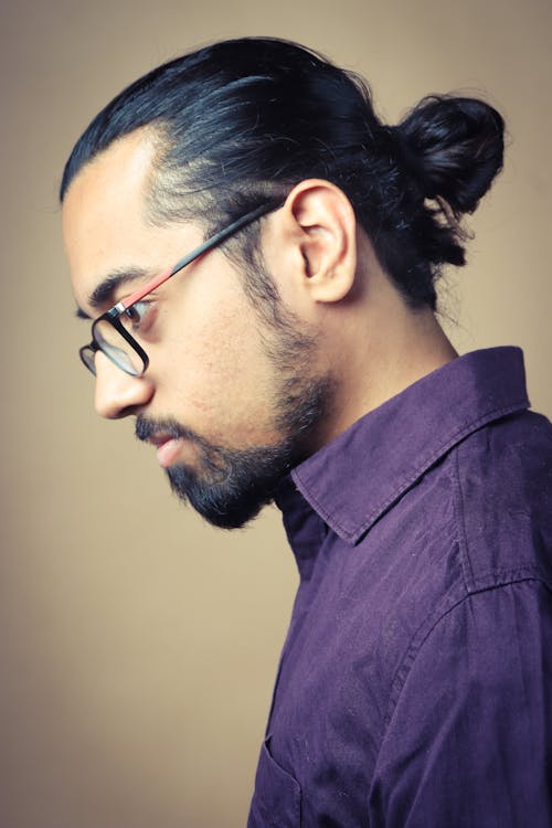 Man in Eyeglasses and Purple Shirt