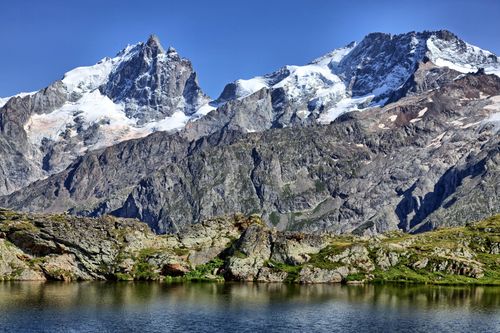 Free Breathtaking view of the Alps in La Grave, France, featuring rugged mountains and clear skies. Stock Photo