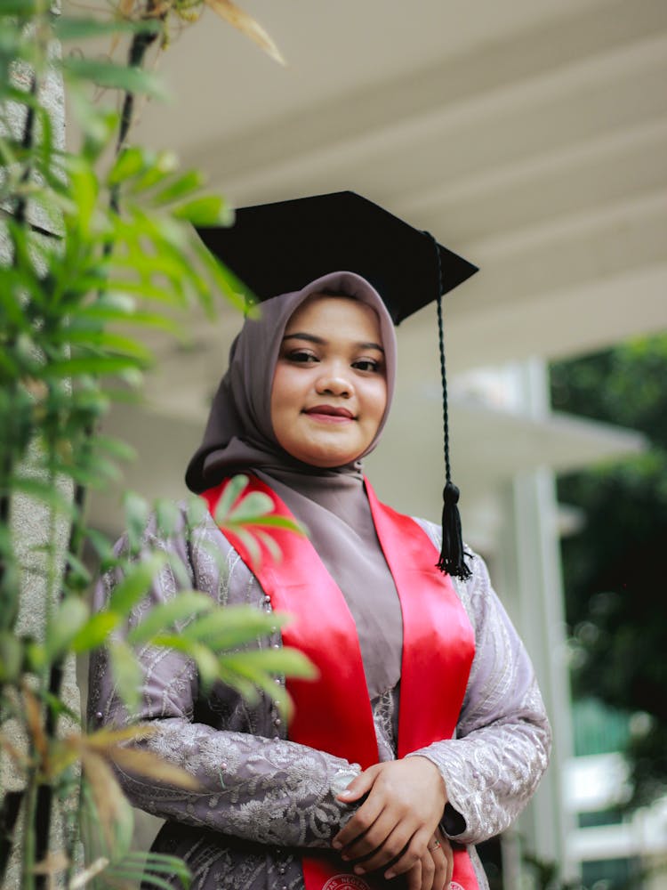 Smiling Woman In A Graduation Cap