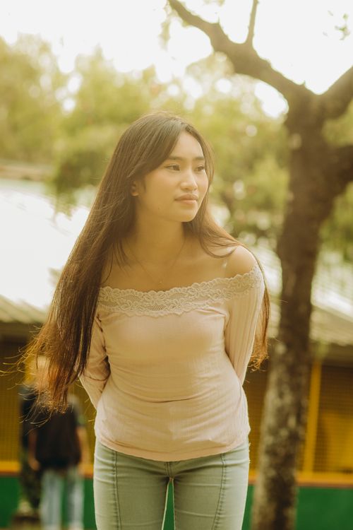 Portrait of Brunette Woman in a Park · Free Stock Photo