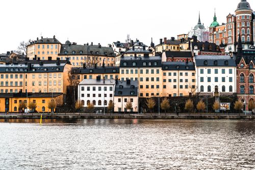 Free Charming townhouses along the Riddarfjärden waterfront in Stockholm, Sweden. Stock Photo