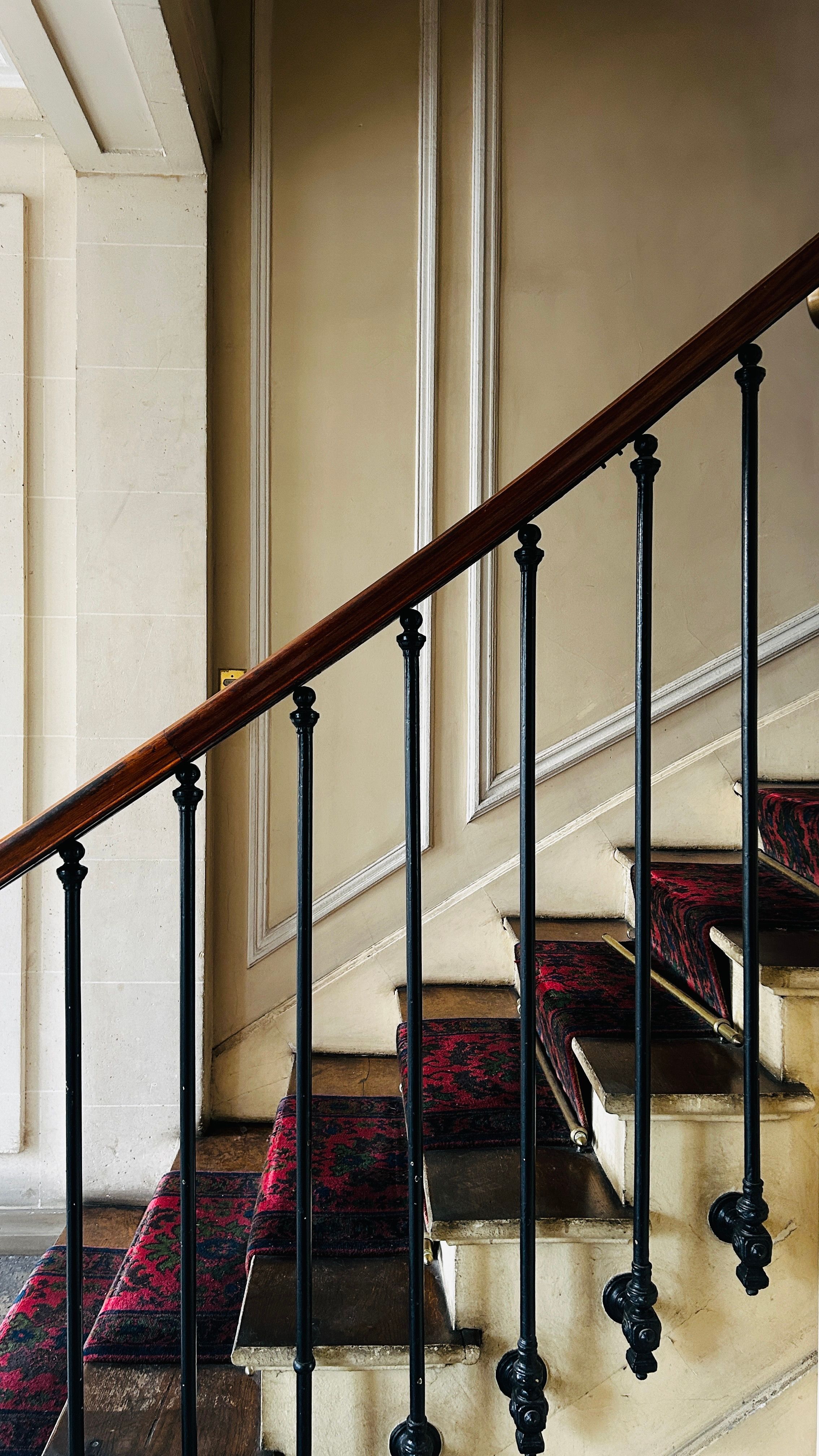 A home staircase with a railing