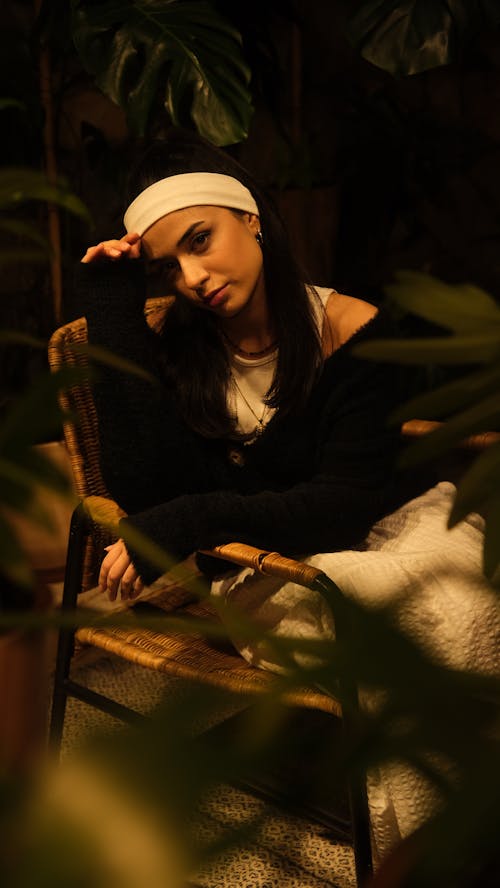 Brunette Woman in Hairband Sitting