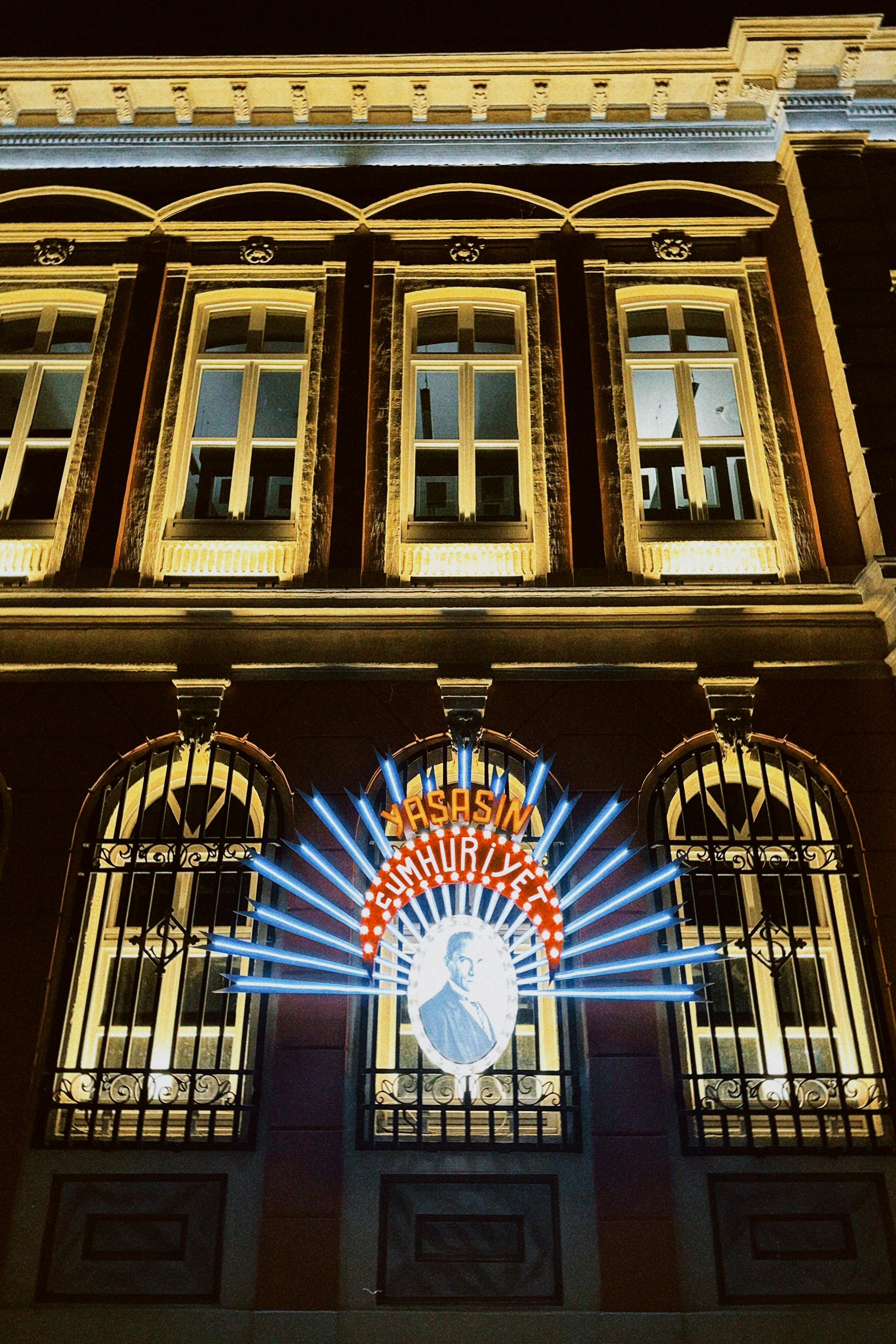 Neon on Classic Building Facade · Free Stock Photo