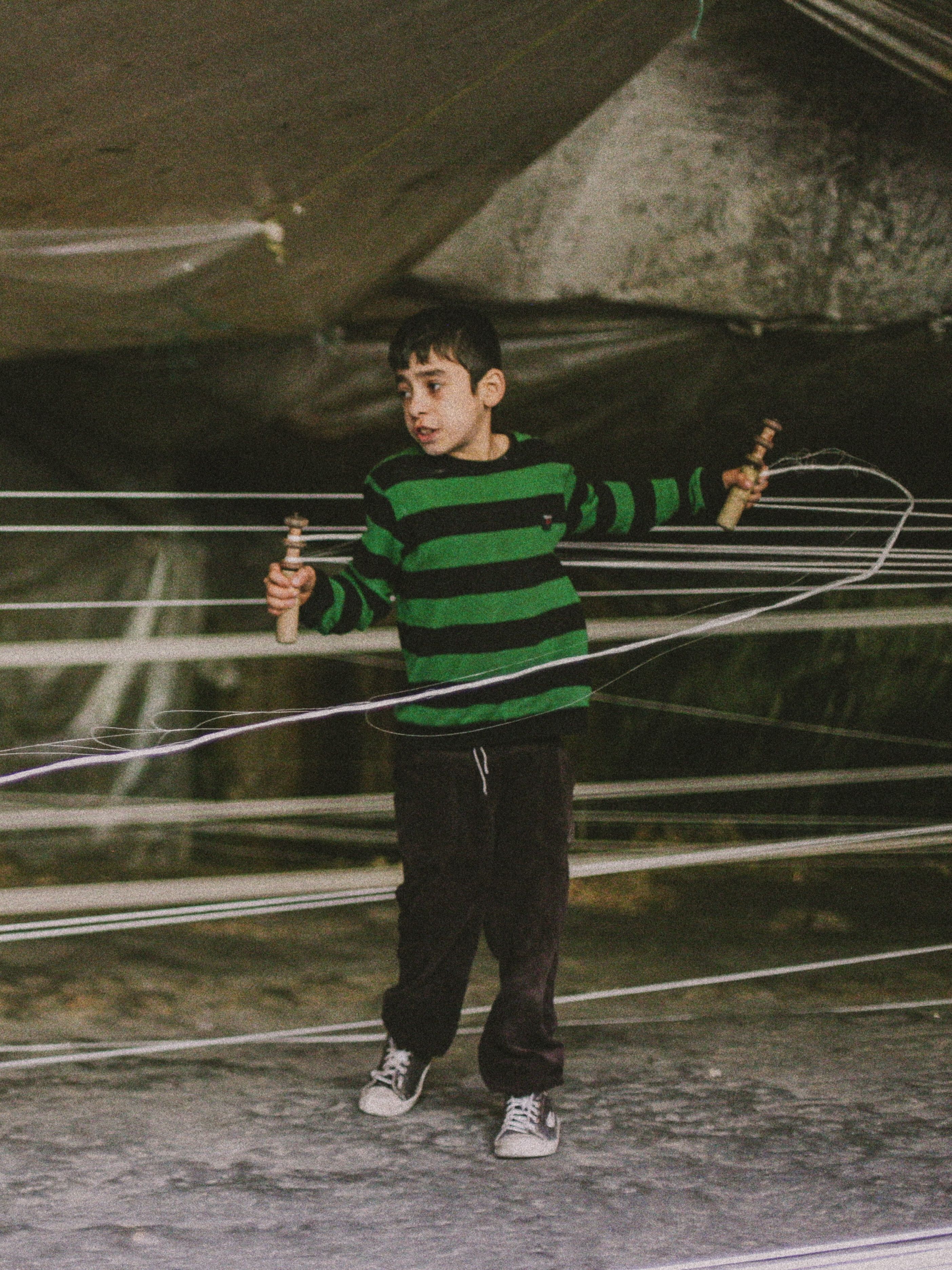A Boy Preparing the Threads for Weaving · Free Stock Photo