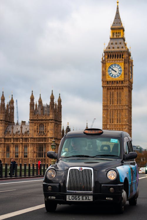 Black Taxi in London with Big Ben behind