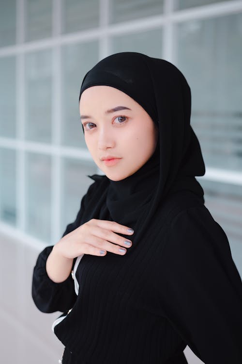 Portrait of a Young Woman in a Black Hijab Headscarf