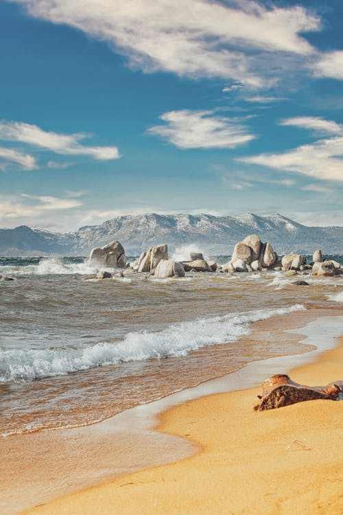 Boulders on Ocean Shore on Sunny Day