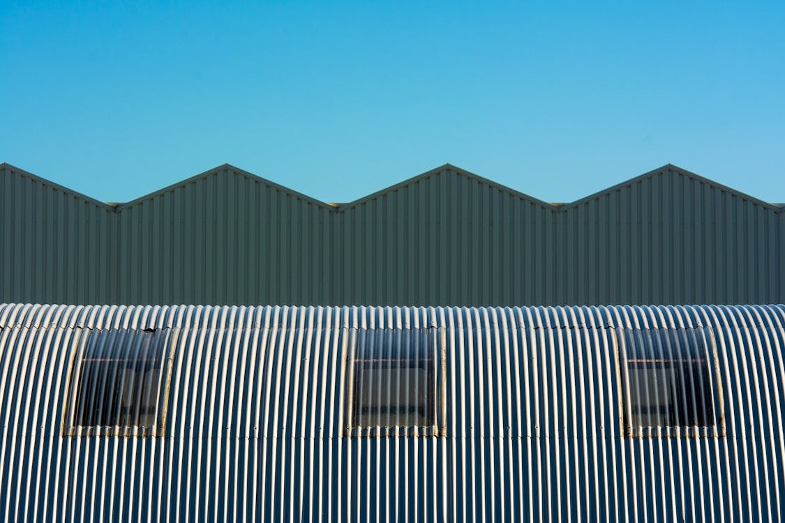 Windows in a Cylindrical Roof Made of Corrugated Sheet Metal
