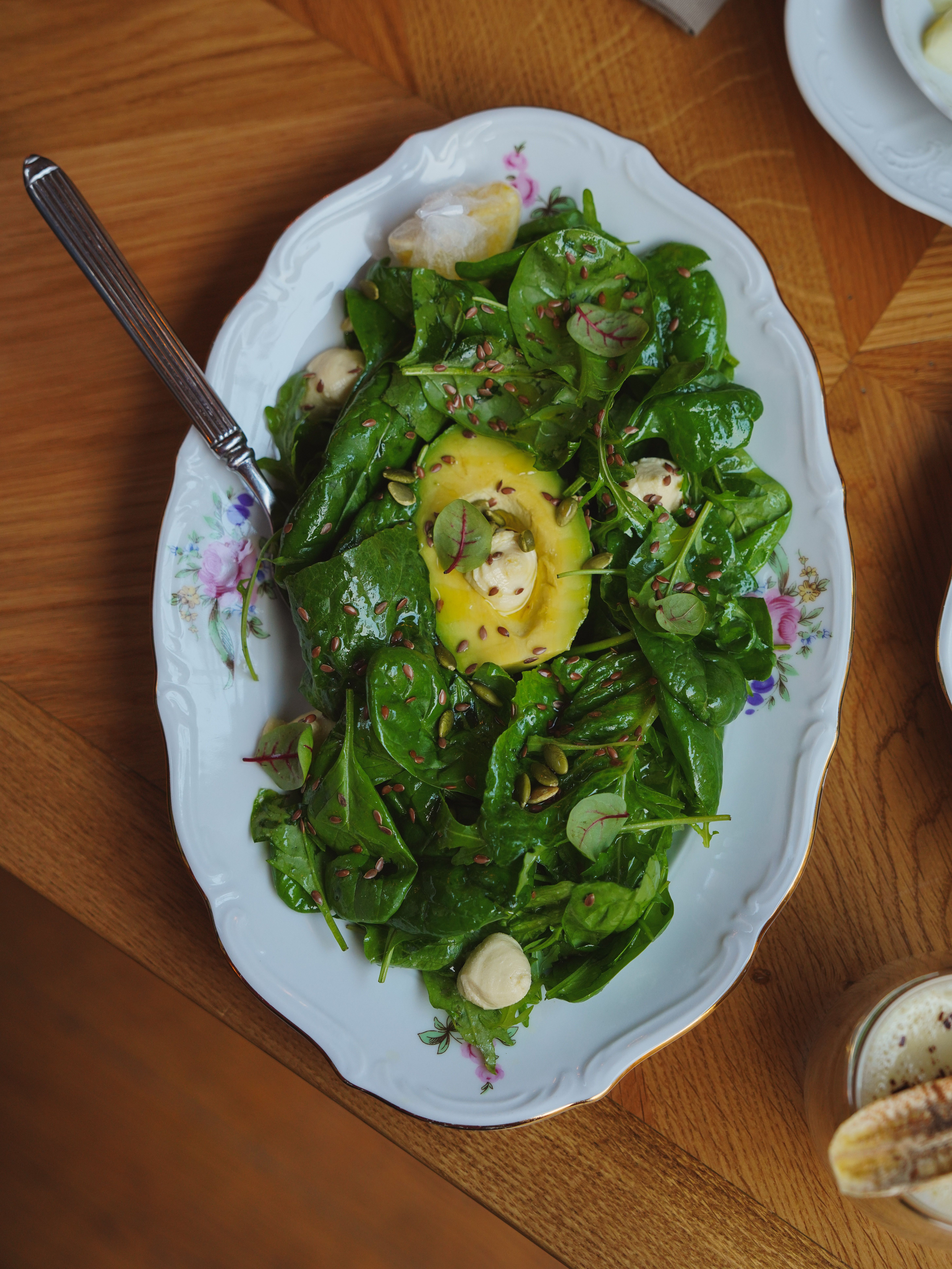 spinach and avocado on plate