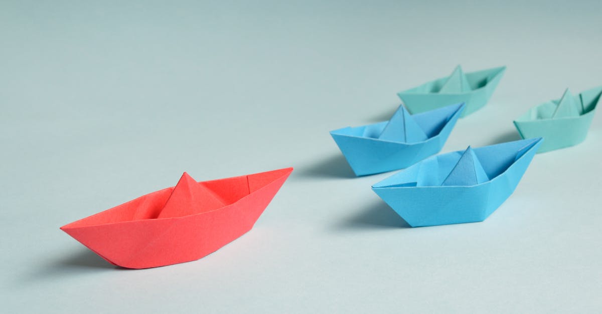 Paper Boats on Solid Surface