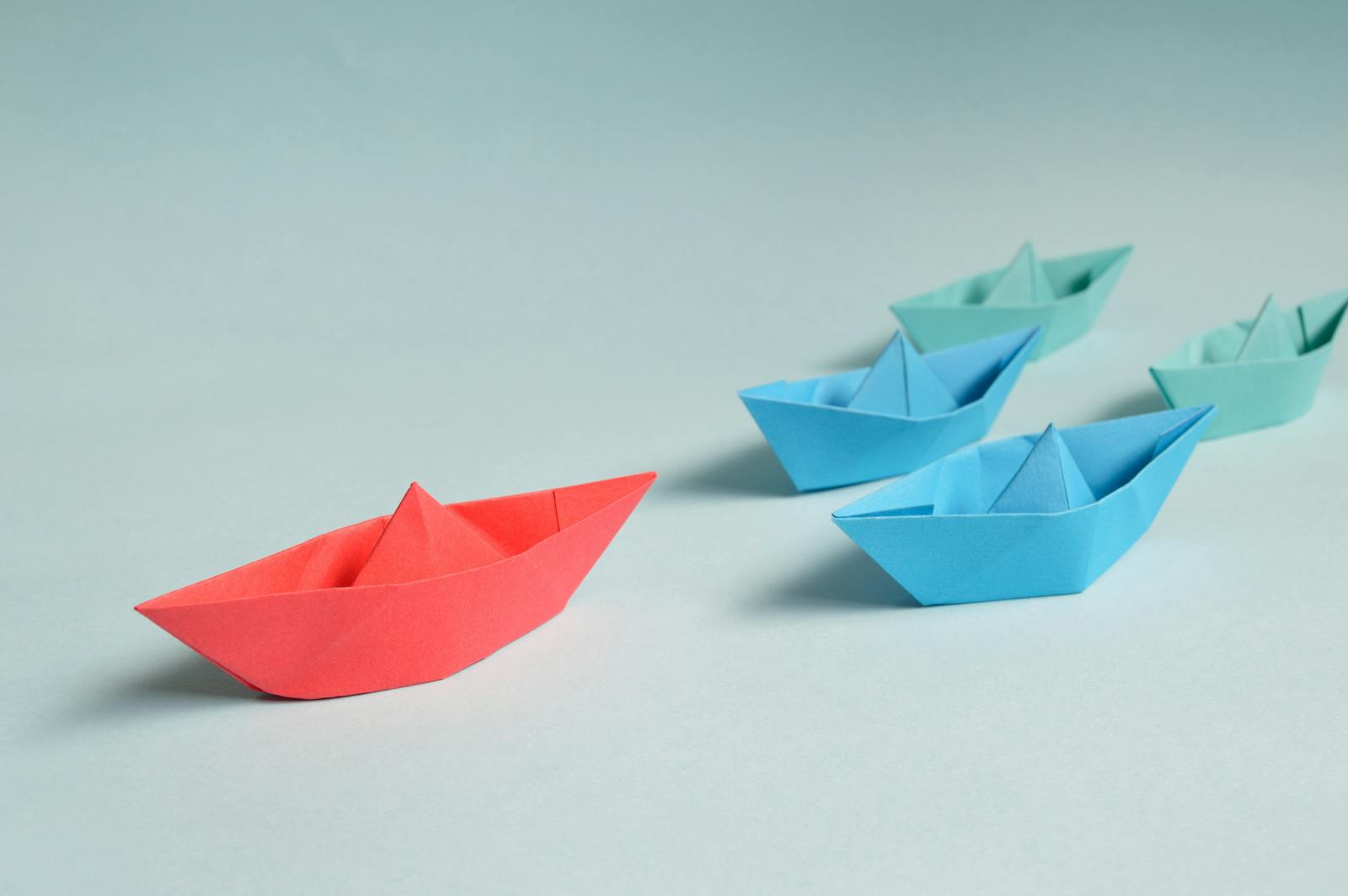 Leadership Photo by Miguel Á. Padriñán from Pexels: https://www.pexels.com/photo/paper-boats-on-solid-surface-194094/