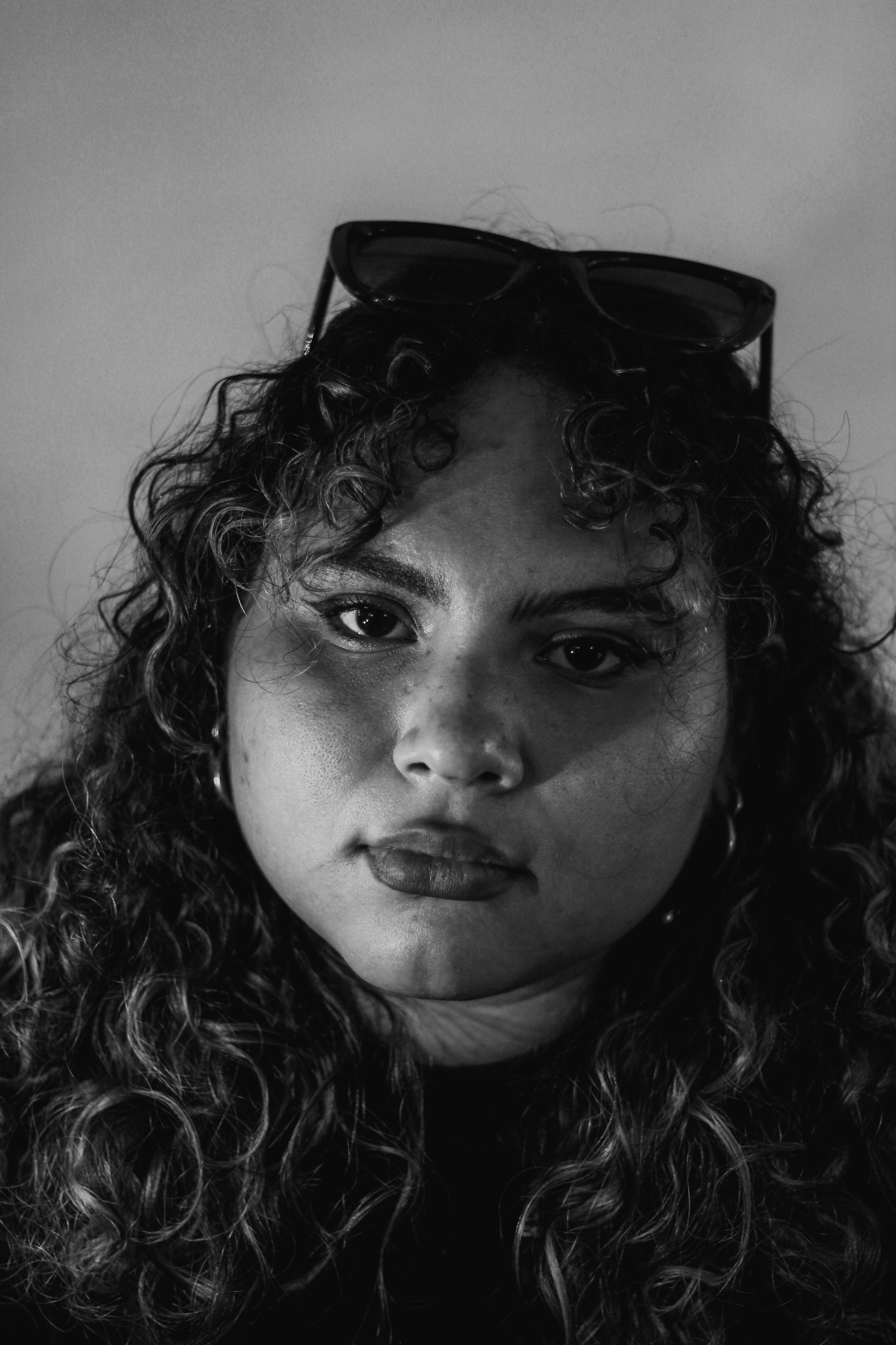 Black and White Portrait of a Young woman with Curly Hair · Free Stock ...